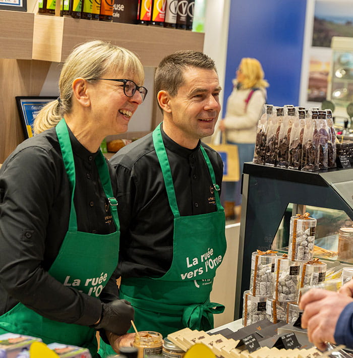 Exhibitors smiling at visitors